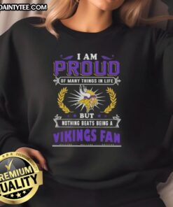 Alt Text: Cozy sweatshirt with 'Good I Am Proud Of Many Things But Nothing Beats Being A Minnesota Vikings Fan' design.
