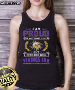 Alt Text: Minnesota Vikings fan wearing a tank top that says 'I Am Proud of Many Things, But Nothing Beats Being a Vikings Fan.'