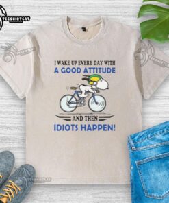 Good I Wake Up Every Day With A Good Attitude And Then Idiots Happen washed t-shirt design featuring a humorous quote.
