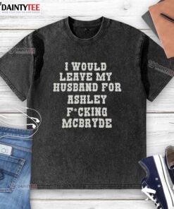 Good I Would Leave My Husband For Ashley McBryde text print on a washed t-shirt, showcasing a fun country music fan design.