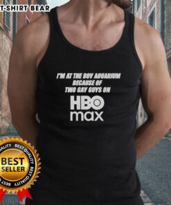 Two gay guys in an HBO Max tank top enjoying their time at the aquarium, showcasing LGBTQ+ pride and joy.