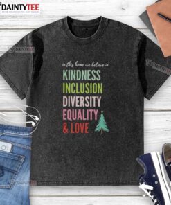 Alt Text: Good In This Home T-Shirt featuring kindness, inclusion, diversity, equality, and love with a Christmas tree design.