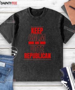 Good Keep Calm And Vote Republican washed t-shirt displayed on a wooden background, promoting patriotic fashion.