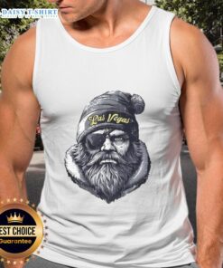 Las Vegas Raiders mascot wearing a beanie, sunglasses, and a tank top, showcasing team spirit in a fun outfit.