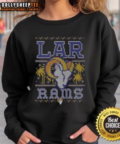 Cozy Good Los Angeles Rams holiday sweatshirt featuring team logo and festive design for fans celebrating the season.