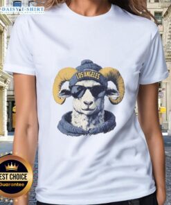 Los Angeles Rams mascot in a beanie and sunglasses, showcasing team spirit on a ladies' tee.