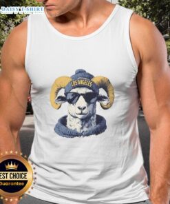 Los Angeles Rams mascot in a beanie and sunglasses, wearing a tank top, ready for a fun game day atmosphere.