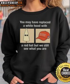 Good Maga sweatshirt featuring a bold statement on racism, showcasing a red hat against a dark background.