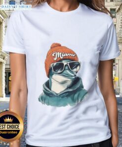 Miami Dolphins mascot in a beanie and sunglasses on a ladies tee, showcasing team spirit and style.