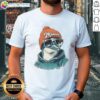 Alt Text: Good Miami Dolphins mascot in a beanie and sunglasses, showcasing team spirit on a trendy t-shirt.