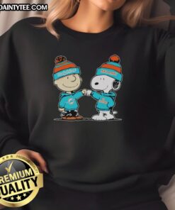 Good Miami Dolphins Snoopy and Charlie Brown Best Friends sweatshirt featuring vibrant colors and playful design.