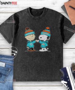 Alt Text: Good Miami Dolphins Snoopy and Charlie Brown Best Friends washed t-shirt featuring iconic cartoon characters.