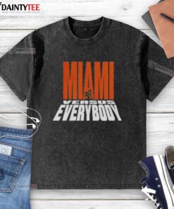 Miami Hurricanes football washed t-shirt featuring the 'Miami Versus Everybody' mascot silhouette design.