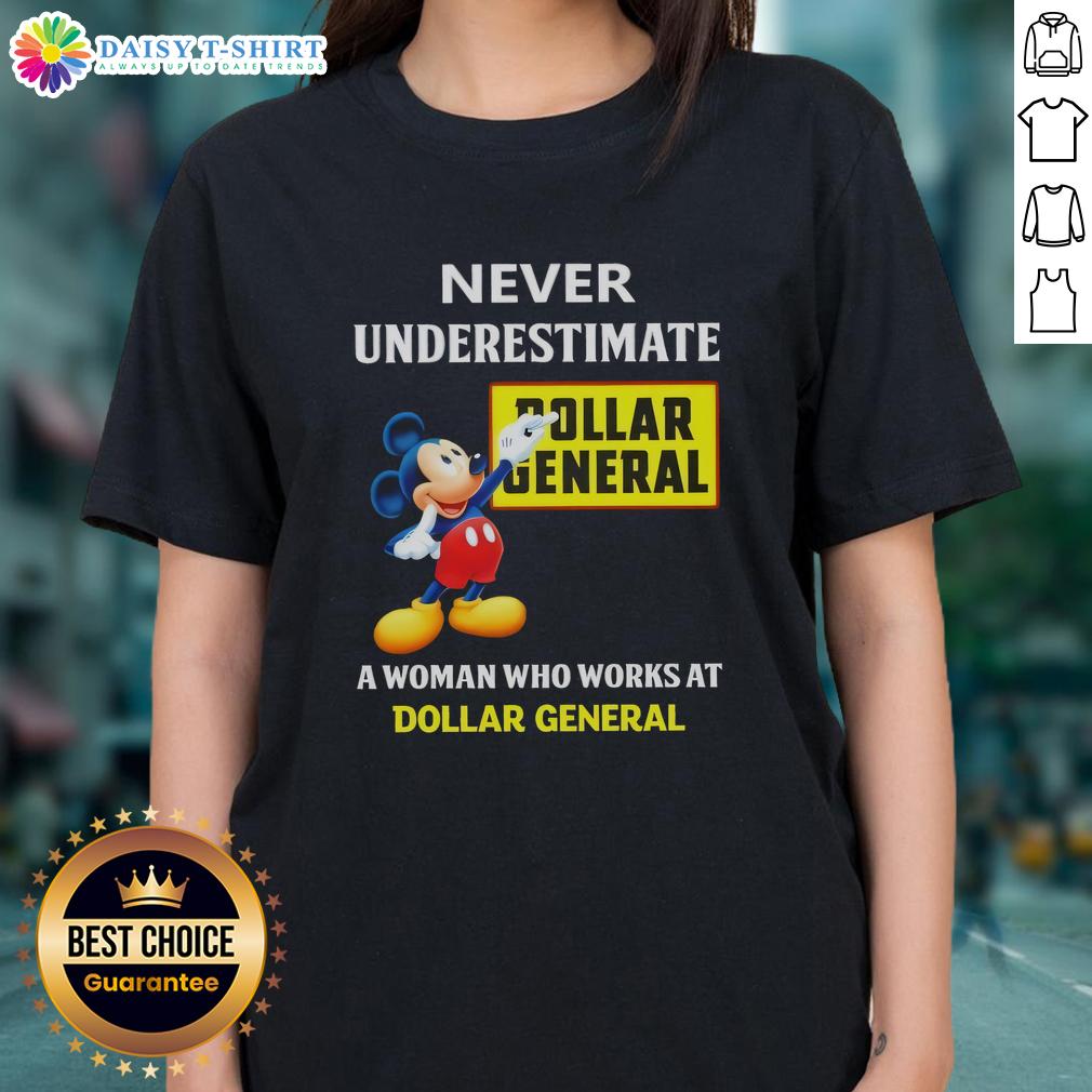 Good Mickey Never Underestimate Dollar General A Woman Who Works At Dollar General Ladies-Tee Empowering woman wearing a 'Never Underestimate a Dollar General Employee' tee at Dollar General store.