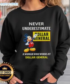 Good Mickey Never Underestimate Dollar General sweatshirt worn by a woman working at Dollar General, showcasing retail pride.