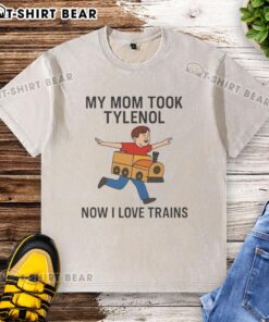 Good My Mom Took Tylenol Now I Love Trains meme on a washed t-shirt, showcasing a humorous, playful design.