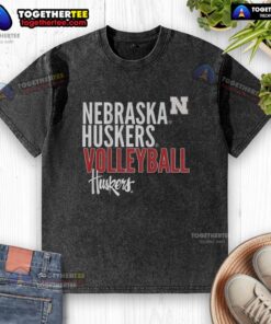 Good Nebraska Huskers Volleyball text logo overlay on a washed t-shirt, perfect for fans and casual wear.