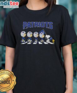 Alt Text: Good New England Patriots X Peanuts Snoopy and Friends Abbey Road ladies tee featuring iconic characters in team colors.