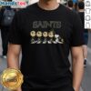 Good New Orleans Saints X Peanuts Snoopy and Friends Abbey Road T-Shirt featuring Snoopy and friends in Saints gear.