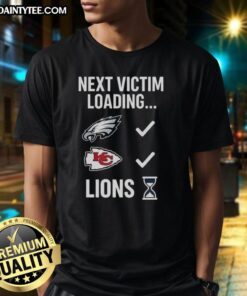 Good Next Victim Loading Lions Hourglass T-Shirt featuring a unique graphic design and bold text for a striking look.