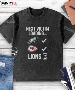 Good Next Victim Loading Lions Hourglass Washed T-Shirt featuring a unique graphic design and soft fabric for casual style.