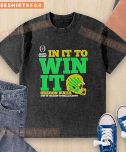 Good Oregon Ducks In It To Win It CFP 2025-26 helmet washed t-shirt featuring team colors and logo.