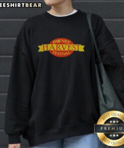 Alt Text: Cozy sweatshirt featuring the Good Pawnee Harvest Festival logo, perfect for celebrating autumn festivities.
