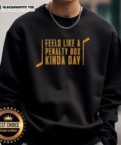 Cozy sweatshirt featuring Pittsburgh Penguins logo, perfect for chilly days and hockey fans, ideal for penalty box vibes.