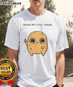 Good Sad Nuggie crying but trying mascot cartoon on a fun t-shirt design, perfect for quirky fashion lovers.