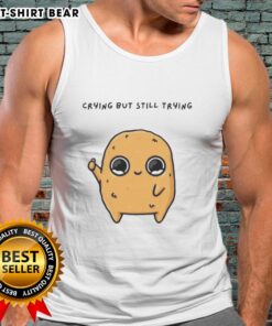 Alt Text: Cartoon mascot wearing a tank top, showing a good-sad nuggie expression while crying but trying to smile.