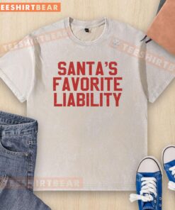 Funny political Christmas t-shirt featuring 'Good Santa's Favorite Liability' design in a stylish wash for holiday cheer.