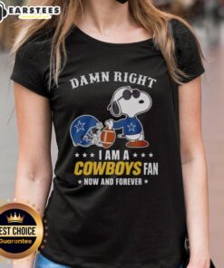 Good Snoopy football graphic on a ladies tee, proudly declaring 'Damn right, I am a Cowboys fan now and forever.'