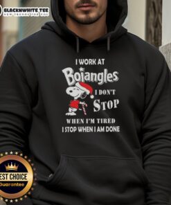 Christmas hoodie featuring Snoopy with 'I work at Bojangles' and motivational quote for holiday cheer.