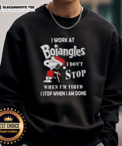 Good Snoopy Christmas sweatshirt featuring 'I work at Bojangles, I don't stop when I'm tired, I stop when I'm done' slogan.