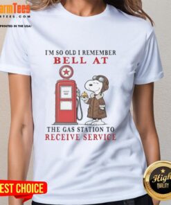 Snoopy graphic tee featuring nostalgic text about old gas station service bells, perfect for vintage cartoon fans.