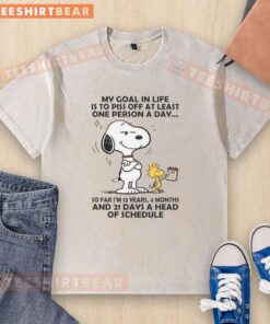 Good Snoopy t-shirt with the quote 'My goal in life is to piss off at least one person a day' in vibrant colors.