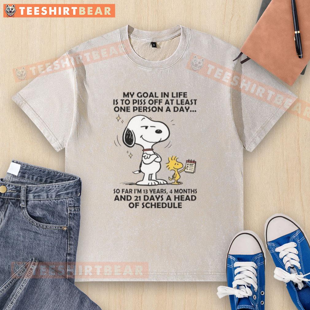 good-snoopy-my-goal-in-life-is-to-piss-off-at-least-one-person-a-day-washed-t-shirt Good Snoopy t-shirt with the quote 'My goal in life is to piss off at least one person a day' in vibrant colors.