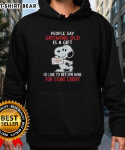 Funny hoodie featuring Snoopy with the phrase about growing old as a gift, perfect for humorous gift lovers.