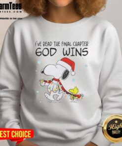 Cozy sweatshirt featuring Snoopy and Woodstock with 'God Wins' text and Christmas lights, perfect for holiday spirit.