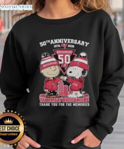 Good Tampa Bay Buccaneers outfit featuring Snoopy and Charlie Brown 50th Anniversary sweatshirt, 1976-2026.