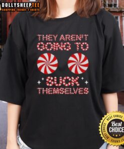 Funny Christmas ladies tee featuring 'Good, they aren't going to suck themselves' candy design for festive humor.