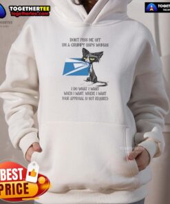 Grumpy USPS woman in a hoodie with a tired cat, showcasing a humorous attitude and the phrase 'I do what I want.'