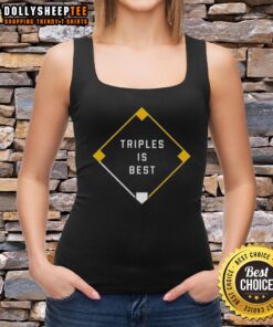 Model wearing Good Triples is Best tank top in a vibrant outdoor setting, showcasing casual summer style and comfort.