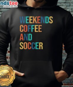 Cozy Good Weekends Coffee and Soccer hoodie displayed on a rustic table with a steaming cup of coffee and a soccer ball.