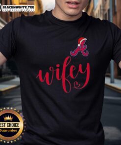 Alt Text: Good Wifey Atlanta Braves Santa Hat Merry Christmas T-Shirt featuring festive design and team logo for holiday cheer.