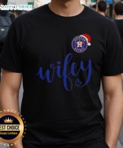 Alt Text: Good Wifey Houston Astros Santa Hat Merry Christmas T-Shirt featuring festive design and team logo for holiday cheer.