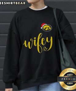 Good Wifey Iowa Hawkeyes sweatshirt with Santa hat, perfect for a Merry Christmas celebration and college sports fans.