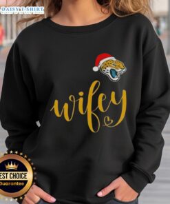 Good Wifey Jacksonville Jaguars Santa Hat Merry Christmas Sweatshirt featuring festive design for holiday fans.
