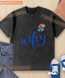 Good Wifey Kansas Jayhawks Santa Hat Merry Christmas washed t-shirt featuring festive colors and team logo.