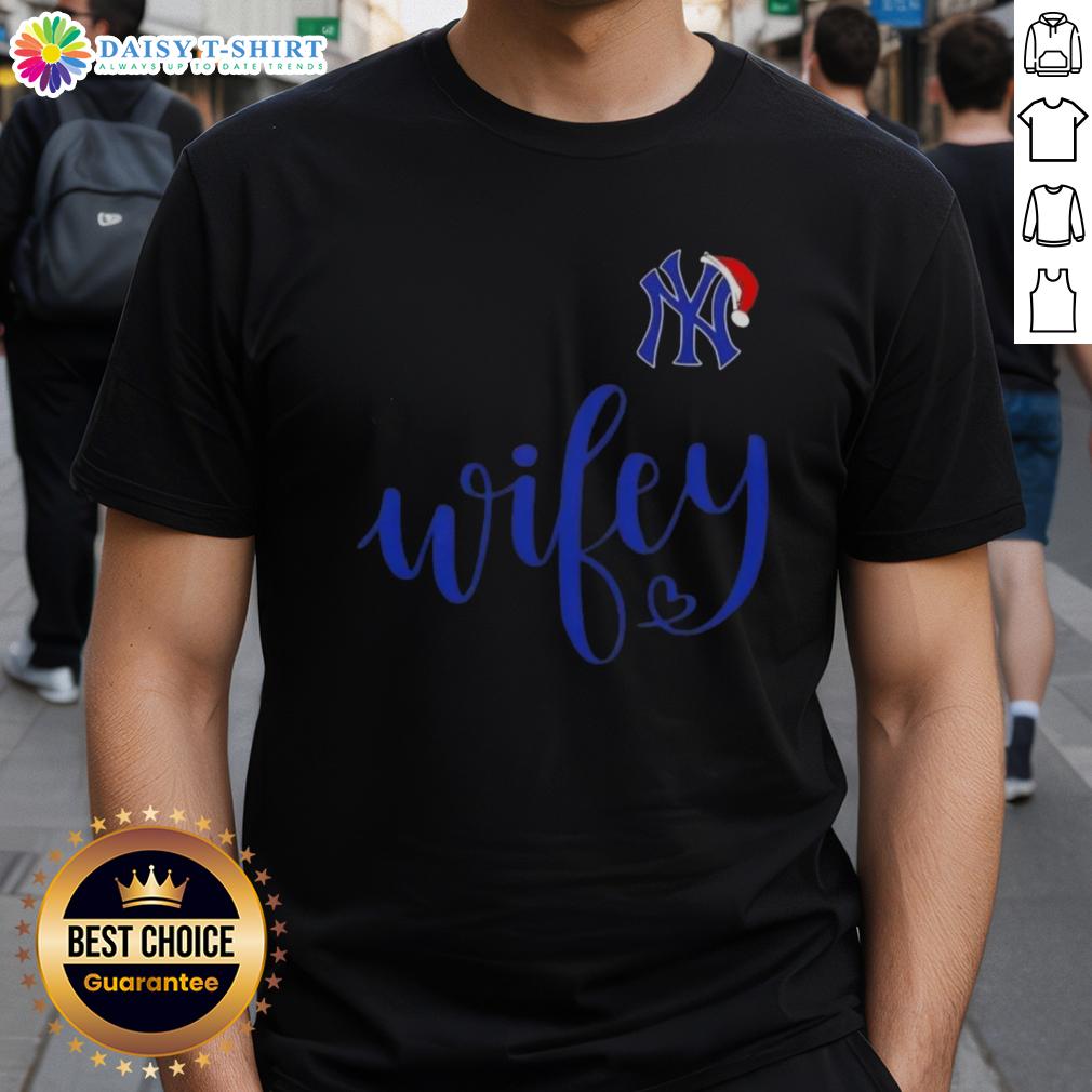 Good Wifey New York Yankees Santa Hat Merry Christmas T Shirt Good Wifey New York Yankees Santa Hat Merry Christmas T-Shirt featuring festive design and team logo for holiday cheer.